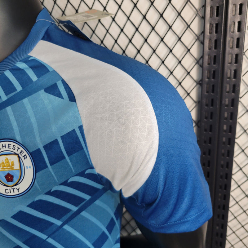 CAMISA VERSÃO PLAYER DO MANCHESTER CITY 23/24 AZUL TREINO