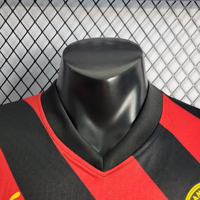 CAMISA VERSÃO PLAYER DO MANCHESTER CITY 22/23 VERMELHO E PRETO