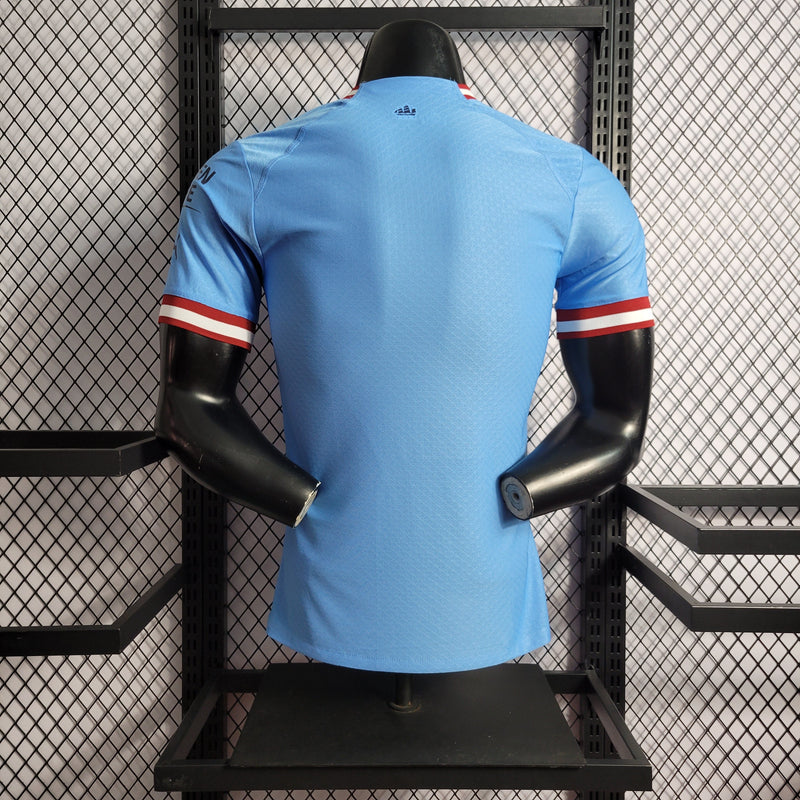 CAMISA VERSÃO PLAYER DO MANCHESTER CITY 22/23 AZUL
